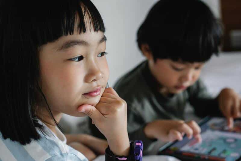 Two little boys in class.